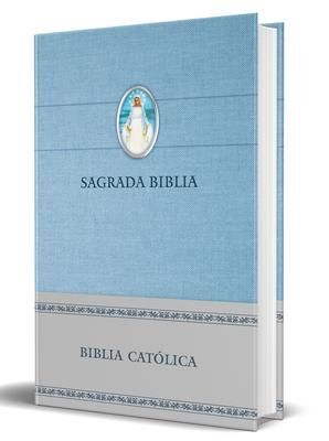 BIBLIA CATOLICA EN ESPANOL. TAPA DURA AZUL, CON VIRGEN MILAGROSA EN CUBIERTA